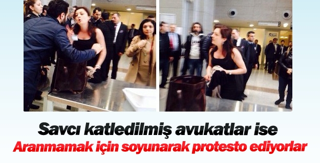 Feminist avukat adliye girişinde soyundu